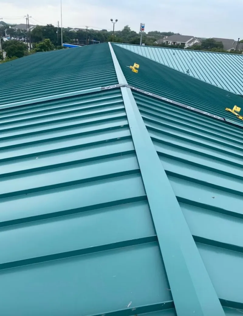 Green commercial metal roof ridge and valley for Metal Roof Repair in Elburn