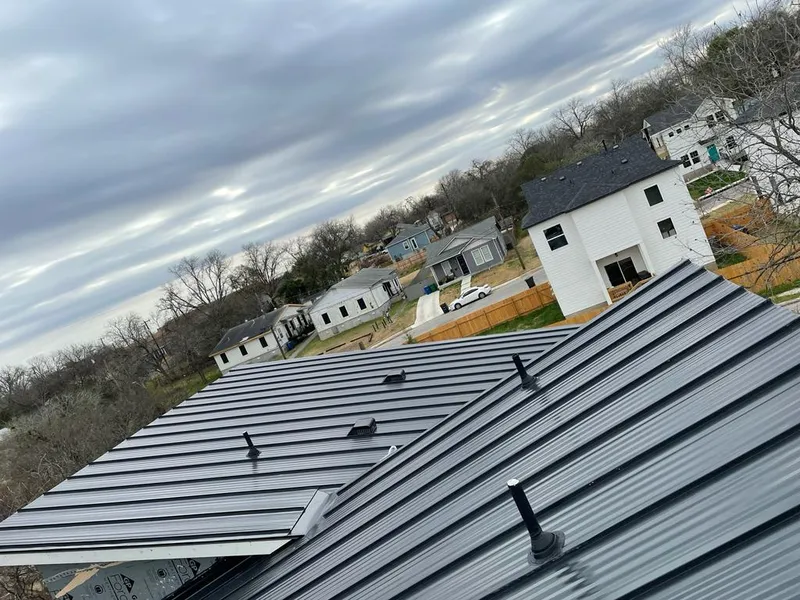 Standing seam metal roof panels with vents for Skylight Repair in Elburn